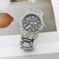 Detailed close-up of octagonal steel watch case with decorative screws and metal strap - Style B Silver Case Silver Band Black Face