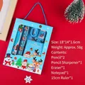 Set de papeterie de Noël bleu avec crayons, règle et gomme dans une boîte cadeau à fenêtre - Bleu