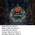 Christmas wreath static window sticker with red bow and Merry Christmas text in gold - Small / Sduv-175