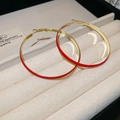 Elegant gold metal hoop earrings with dark red enamel finish on jewelry display - Red (Style 17 Gold-Red Hoop)