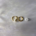 Detailed shot of 18k gold plated stainless steel hoops with white natural stone charms - 2.5*10mm / White Crystal