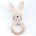 Handmade beige crochet rabbit baby rattle with a natural smooth wooden ring - Smiling Rabbit