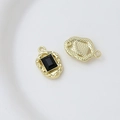 Detailed macro view of gold-plated alloy pendant with black rectangular zircon inlay - Style 21