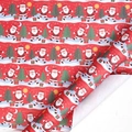Red Christmas wrapping paper roll featuring Santa Claus and tree patterns for large gift boxes - Christmas Series-Holly Whispers / 70*100CM