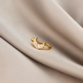 Macro view of gold moon non-pierced clip earring with zircon on beige silk fabric - Moon (E5689-11)