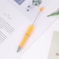 Creative DIY beaded ballpoint pen with vibrant orange silicone grip and metal rod - Macaron Orange