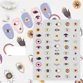 Detail of Me129 Evil Eye nail stickers with purple mystical symbols and stars - Me129
