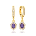 Detailed macro of gold plated hoop earring with purple oval zircon and crystal halo - Purple