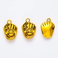 Macro detail of three golden baseball glove charms showing front and back texture - Antique Gold