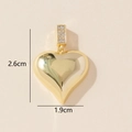 Detailed view of a gold heart pendant with cubic zirconia and size dimensions 2.6x1.9 cm - 0228-17/Gold 3D Simple Heart