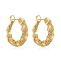Detailed macro view of twisted gold C-shaped hoop earrings with metallic glossy finish - Twisted Texture with Clasp