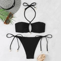 Detail of black honeycomb bikini fabric featuring shell ornaments on tie ends - S / Black