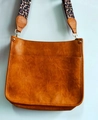 Brown faux leather crossbody bag featuring a front pocket and leopard print wide strap - Yellow Brown