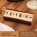 Grand calendrier perpétuel en bois avec jours et dates sur un socle en bois naturel - Grand / Bûche Originale Grand Modèle Semaine