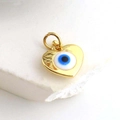 Macro view of gold plated heart evil eye charm with blue zircon inlay for jewelry DIY - Enamel Blue Eye Heart