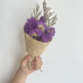 Close-up of mini dried purple statice bouquet wrapped in newspaper style kraft paper - Vintage Mini Rose Red Forget-me-not