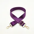 Detail of adjustable purple nylon shoulder strap with gold-tone swivel metal lobster clasps - Deep purple