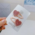 Set of two pink rhinestone heart-shaped hair clips on a white display card - Large Pink Heart BB Clips (Pair)
