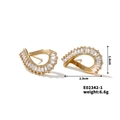 Detail view of wavy gold earrings with micro-set zircons showing 2.9cm x 1.6cm size - E02342-1 Wavy Arc