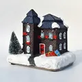 Close-up of glowing Christmas snow house with mini tree and LED lights decor - Style A in Color Box