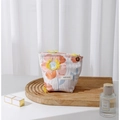 Canvas makeup bag with orange 3D floral embroidery and brand label on a wooden tray - 17x14cm / Yellow Flower Small