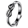 Macro shot of minimalist infinity symbol ring with polished metallic silver finish - US 7 / Black & Gold