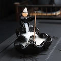 Black ceramic backflow incense burner with lotus leaf design and flowing smoke effect - Gold Interlocking Double Heart