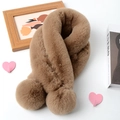Detailed flat lay of brown faux rabbit fur scarf with pom-poms on an aesthetic background - Dark Khaki