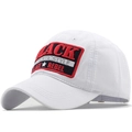 White cotton baseball cap with BLACK REBEL embroidery patch shown from a 45-degree angle - Adjustable / White