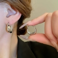 Detail view of silver C-shaped hoop earrings showing the polished finish and clasp design - 22# Ear Buckle - Silver Smooth C-Shape