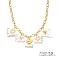 Detail view of gold charm necklace with dimensions for heart, sun, and star pendants - Gold Multi-element Charms