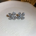 Elegant silver four-petal flower stud earrings with sparkling clear crystals - Gray