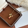 Collana con ciondolo a sacchetto portafortuna placcata oro 18k con zircone e smalto - Stile Borsa della Fortuna Oro