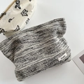 Large capacity textured jacquard cosmetic bag with butterfly embroidery details - Textured Stripes