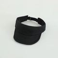Detail view of the black sun visor hat showing wide brim stitching and sweatband - Solid Black