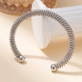 Detailed shot of silver elastic steel wire cuff bracelet with metal spring texture and beads - Silver Ball Spring Style (Silver#3)