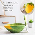 Ceramic corn shaped bowl and spoon set featuring yellow kernels and green leaf design - Corn