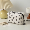 White cosmetic bag with black bow pattern and pearl pendant zipper detail - Square / White Black