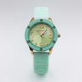 Detail of mint green quartz watch with gold case and heart pattern gradient dial - Green Silicone Strap