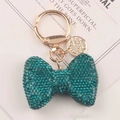 Llavero con lazo de diamantes de imitación azul pavo real y detalles dorados elegantes - Azul Pavo Real
