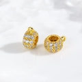 Macro shot of gold-plated copper spacer bead with sparkling cubic zirconia inlay - Large Cylinder Connector / Gold (DMK859G)