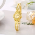 Detailed view of women's gold bracelet watch with oval dial and elegant chain strap - Gold Bangle Oval Dial Style (WAT00478)