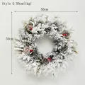Christmas wreath Style G with 50cm diameter featuring snowy pine needles and red berries - Style G 50cm