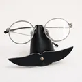 Minimalist black mustache-shaped leather glasses holder stand for office desk storage - Black