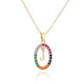Macro shot of 18k gold plated necklace with rainbow zircon J letter pendant detail - Letter J