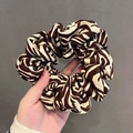 Oversized brown and white zebra print scrunchie in soft fabric held in hand - 16# Zebra Print Coffee