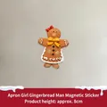 Christmas gingerbread girl magnet with red bow and white icing detail, 8cm height - Apron Girl Gingerbread Man