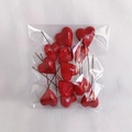 Detail of red foam heart picks for cake decoration and DIY crafts in a pack of 15 pieces - 30mm (Pack)