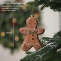 Gingerbread man Christmas tree ornament with white accents and green bow tie - Gingerbread Boy