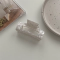 Detailed macro view of large rectangle marble white acetate hair claw clip for women - Large Square Claw / Marble White